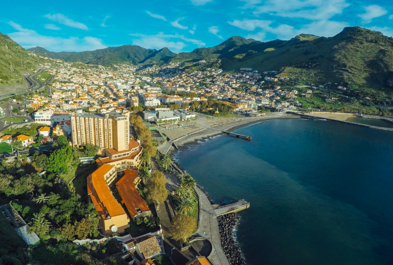 Dom Pedro Madeira Hotel, perfectly nestled in the stunning Machico Bay, surrounded by lush hills and breathtaking landscapes.